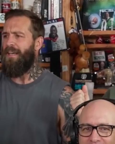 Seat 3, Back left: a face from a Tiny Desk AI sample video