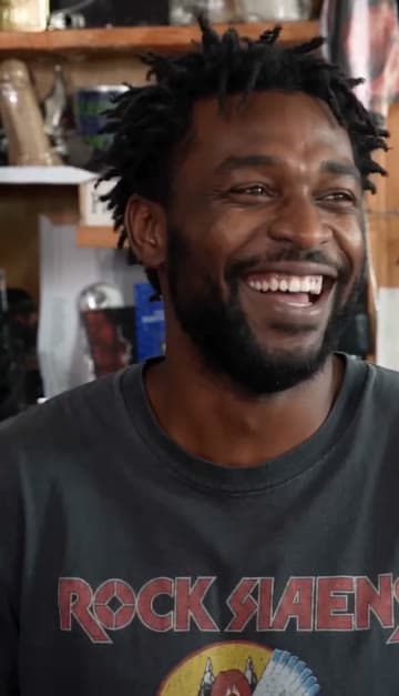 The laugh: a frame from a Tiny Desk AI sample video